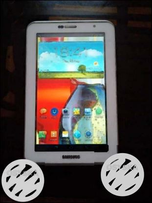 Samsung Tab P3100 with charger. Single hand used.