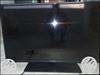 Black Flat Screen TV With Remote