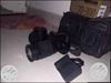 Black Canon DSLR Camera With Lens