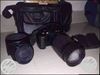 Black Canon DSLR Camera With Lens