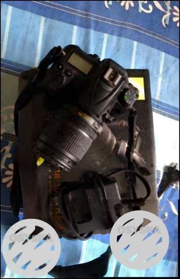 Black Nikon DSLR Camera With Box