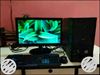 Black Computer Monitor, Keyboard, Mouse, And Tower