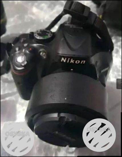 Nikon d5200 new condition with 18 55 and prime