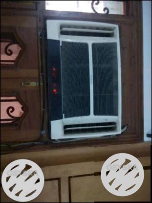 White And Black Window-type AC Unit