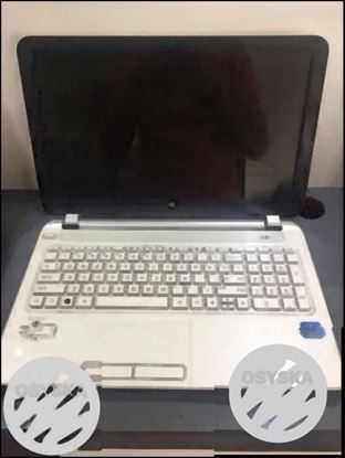 White And Black HP Laptop