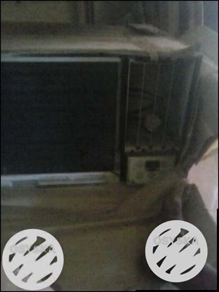An used Samsung window AC 1.5 Ton in working