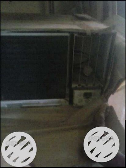 An used Samsung window AC 1.5 Ton in working