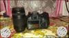 Black Canon DSLR Camera With Lens