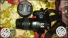 Black Canon DSLR Camera With Lens