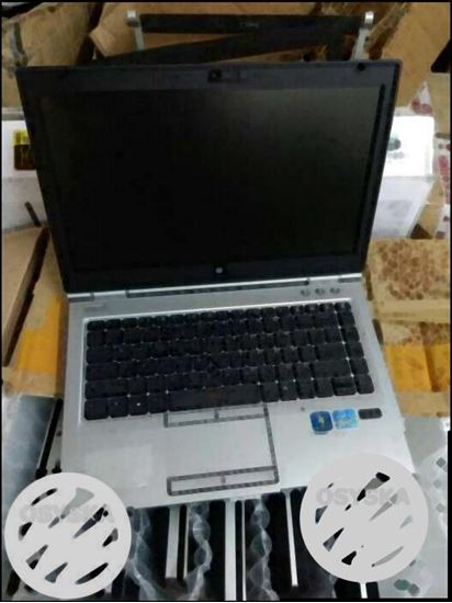 Black Laptop 9939'4'27987 And Silver Hp Laptop