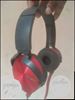 Black And Red Corded Headphones