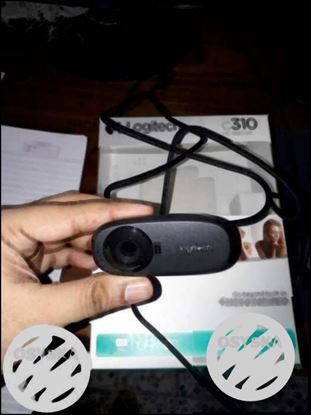 This is a Logitech C310 Webcam in absolutely