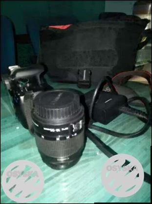 Black And Gray DSLR Camera